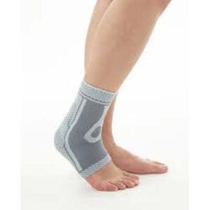 Ankle compression support with silicone pad